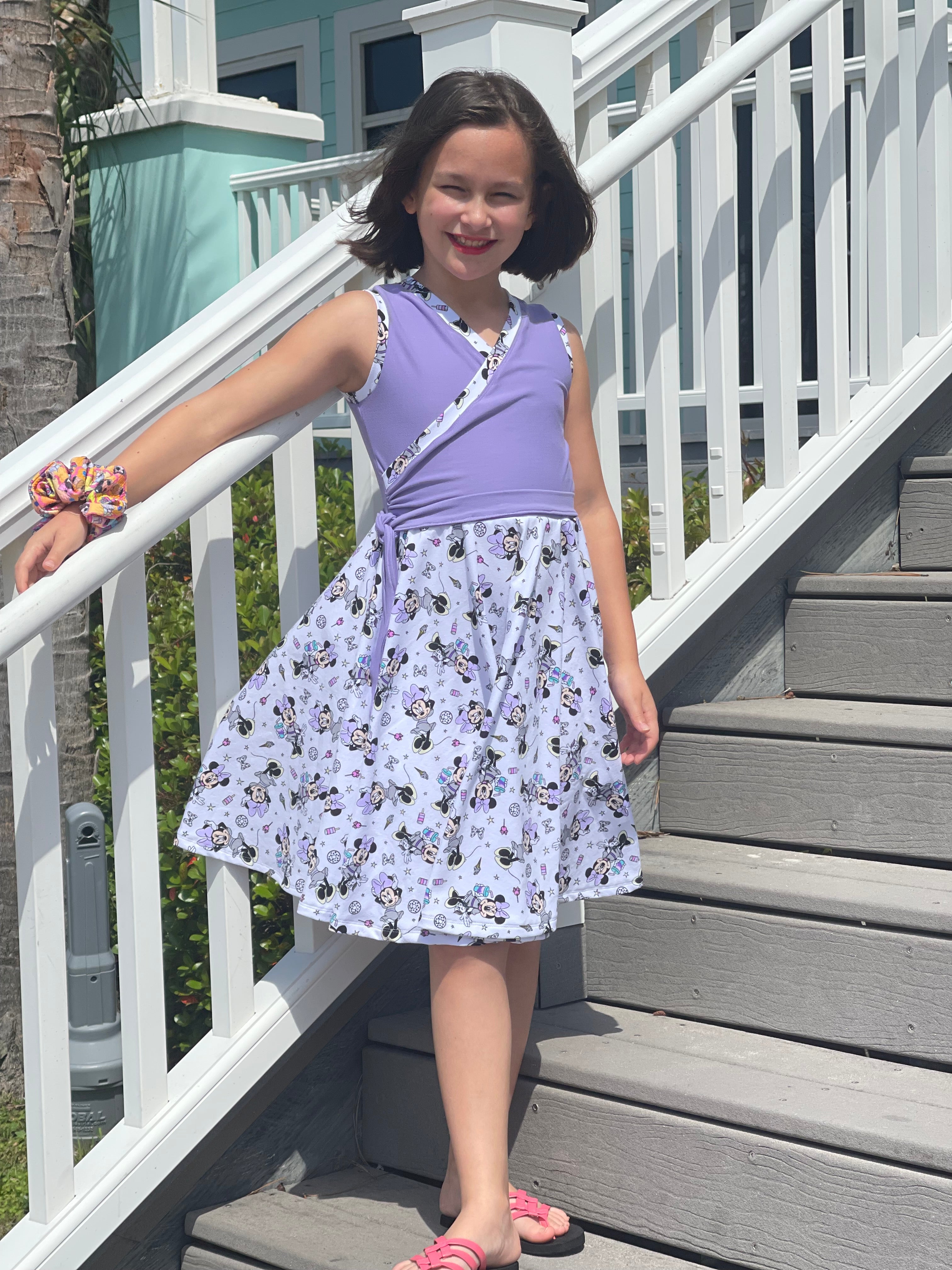 Disney themed fabric in the Tres Belle Dress sewing pattern by Ellie and Mac Patterns. Easy for beginners. A0 A4 Letter and Projector files with sew along video tutorial.