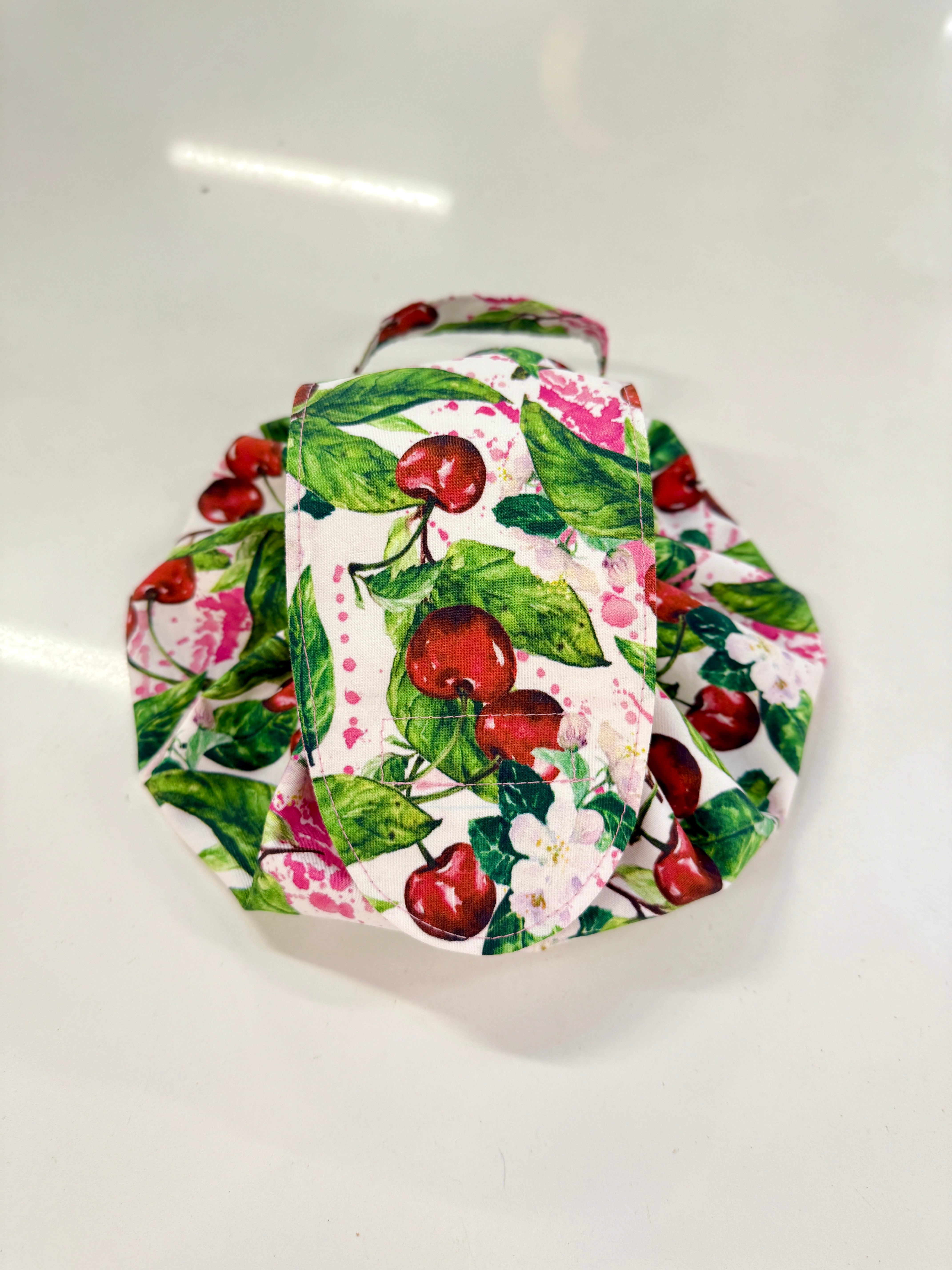 Woven cherry print fabric Moon Drawstring Bag. Great for traveling, craft storage, picnics, kids toys, and more.