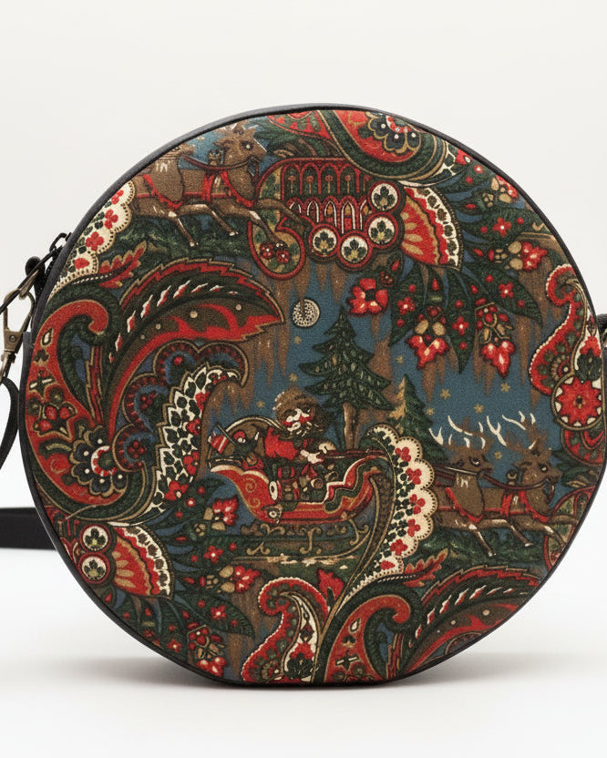 Round bag with intricate pattern on a light gray background. DIY bag.
