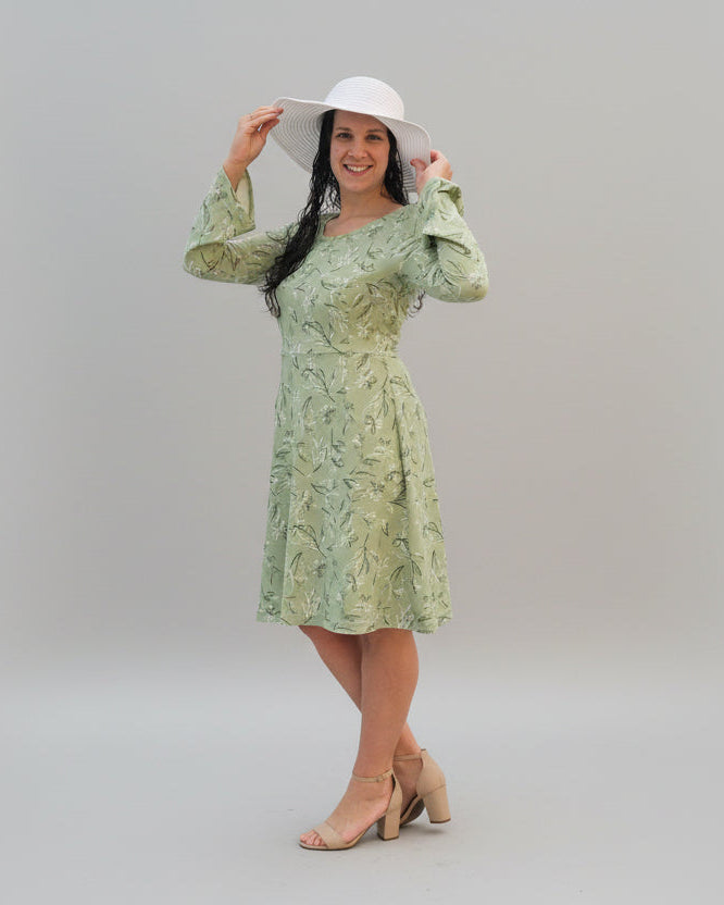 Green bell sleeve dress with cup sizes built-in. PDF sewing pattern