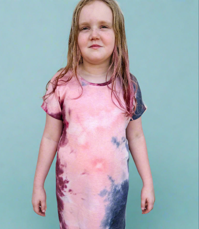 Young girl wearing a tie-dye dress