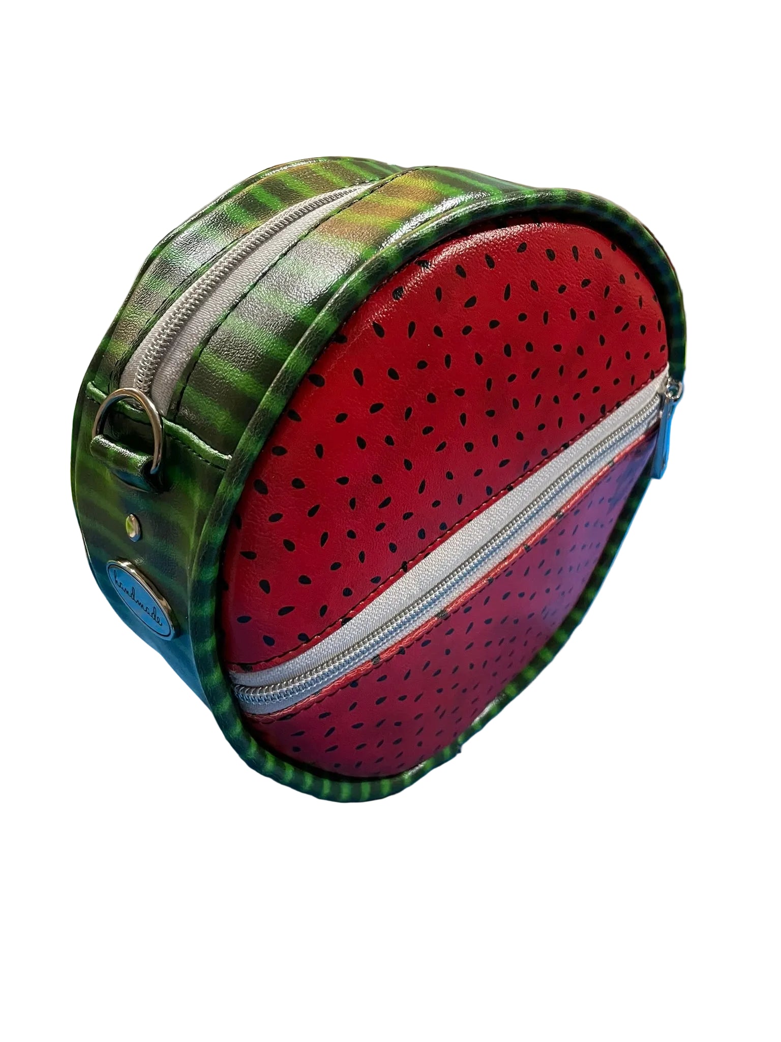 Detail shot showing the clean, precise curved seams of the circle bag.