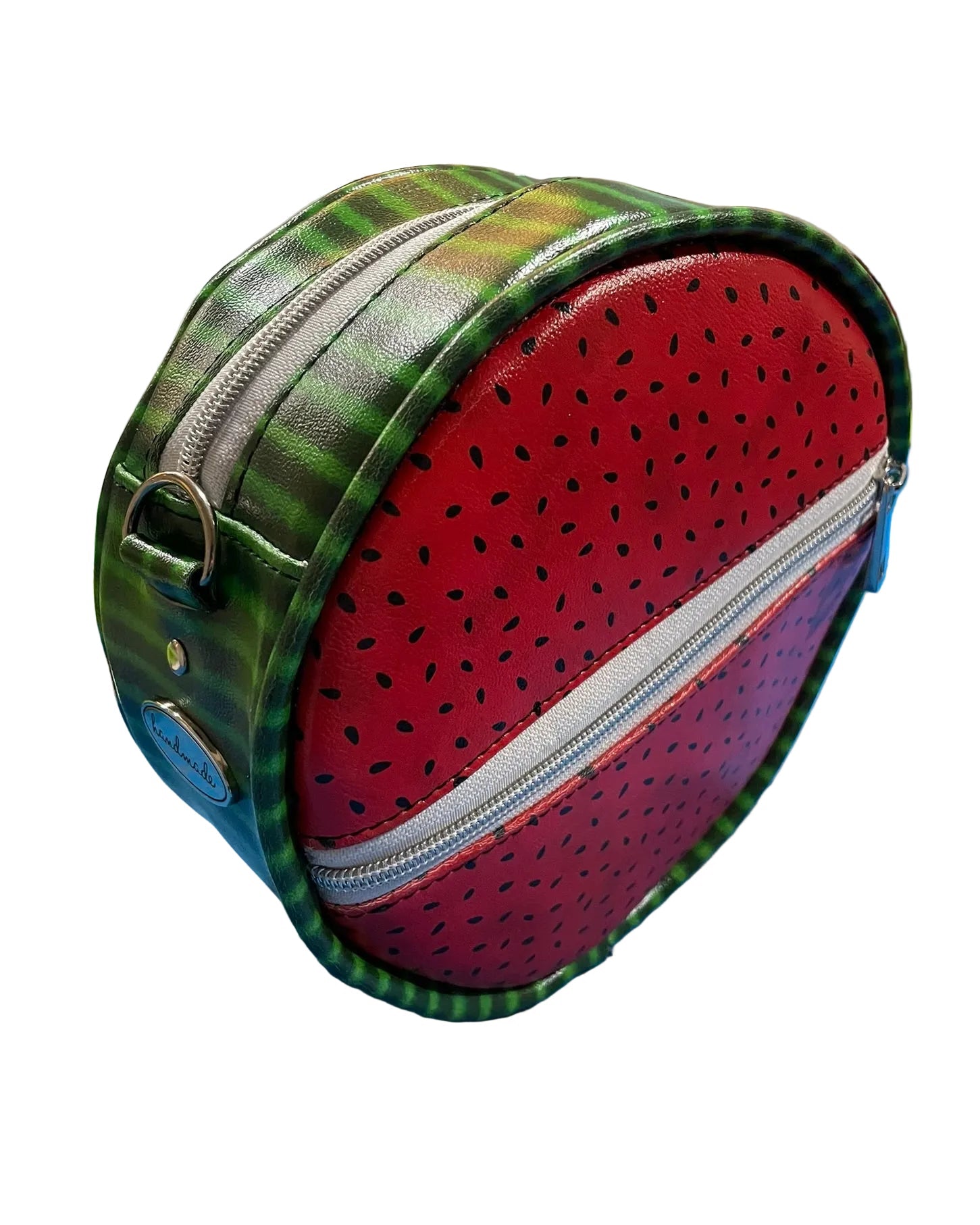 Detail shot showing the clean, precise curved seams of the circle bag.