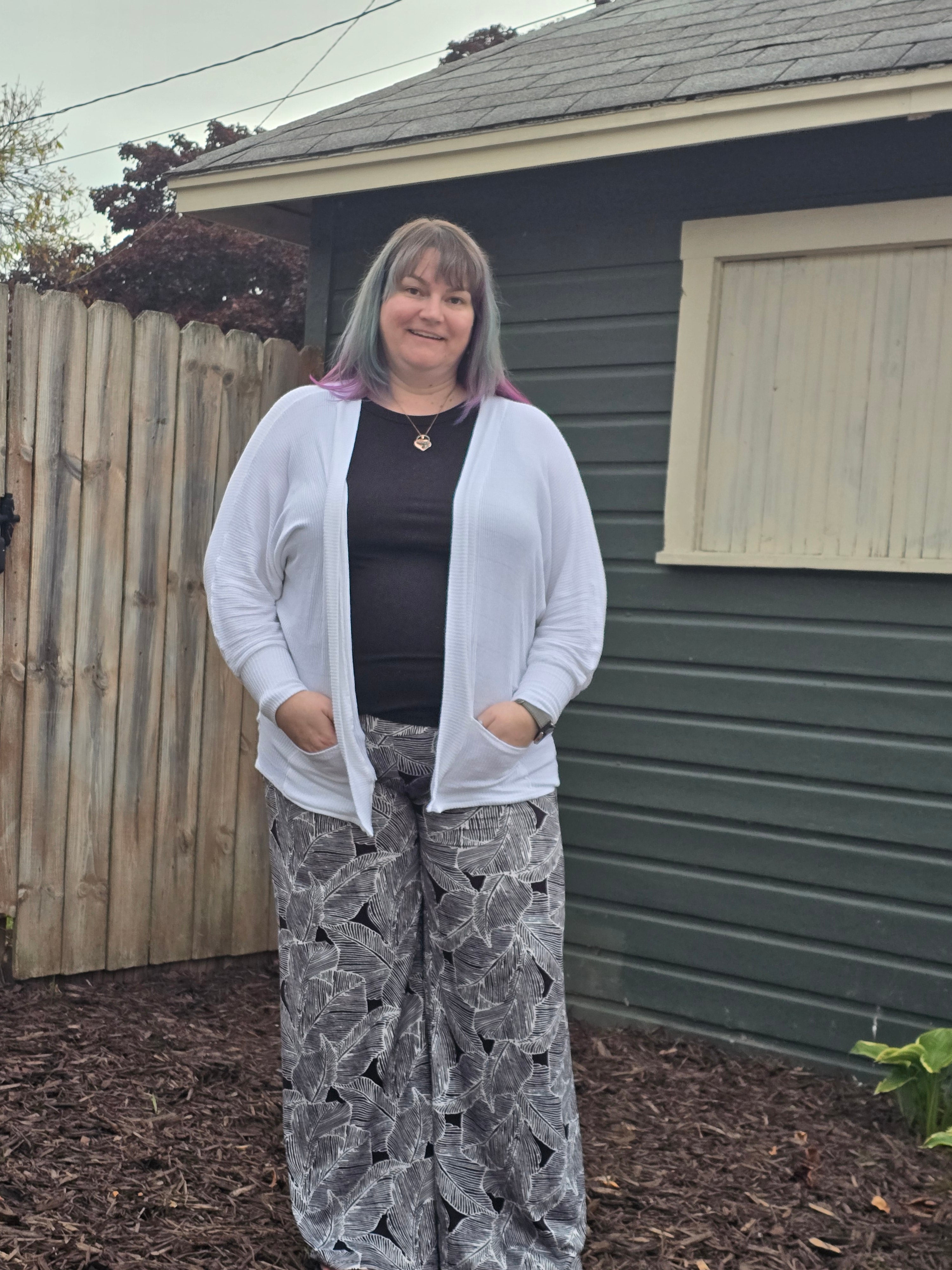 Lightweight knit layering cardigan styled for everyday wear