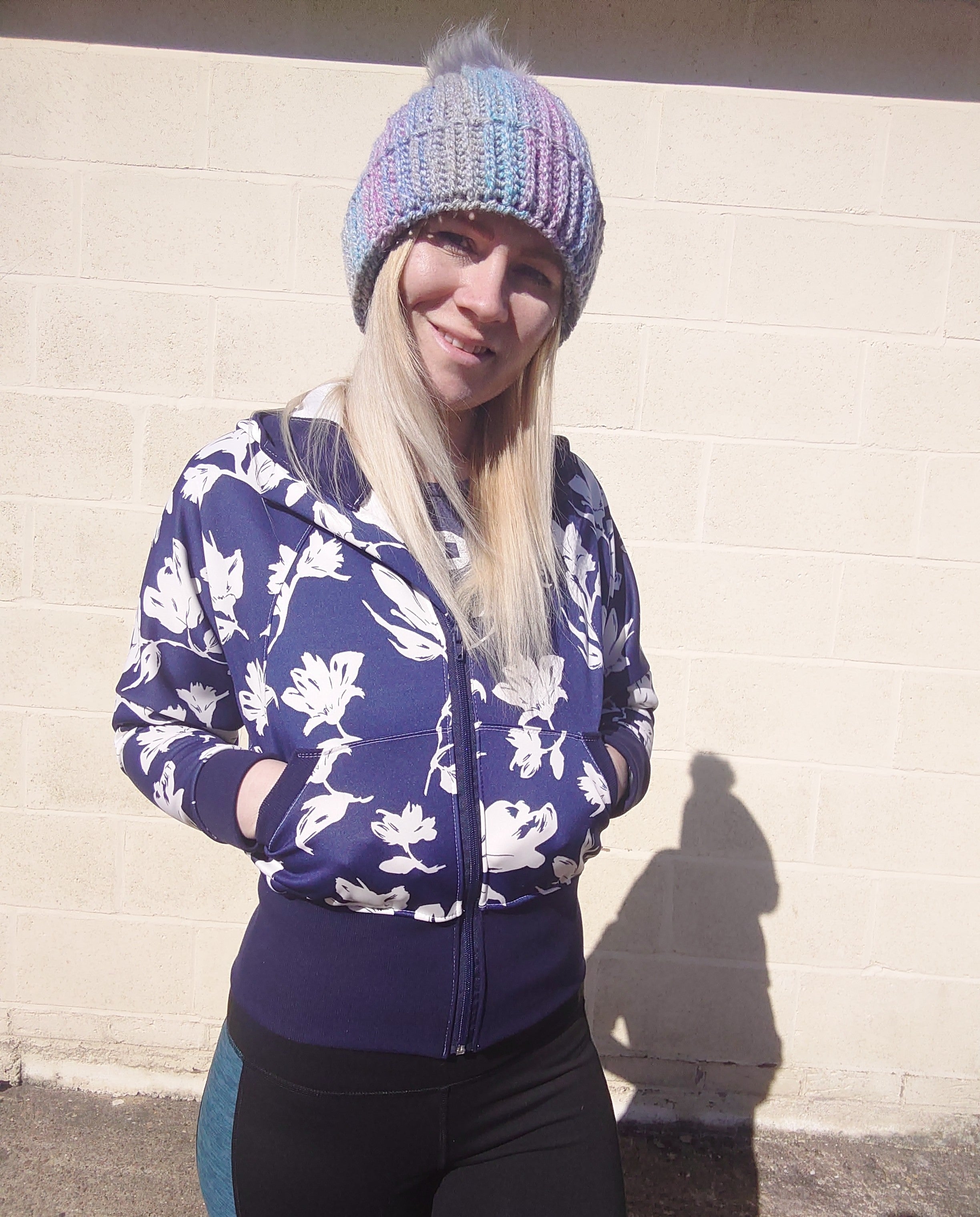 Navy floral knit fabric athletic jacket by Ellie and Mac sewing patterns. Easy sewing tutorial. Zip up style.