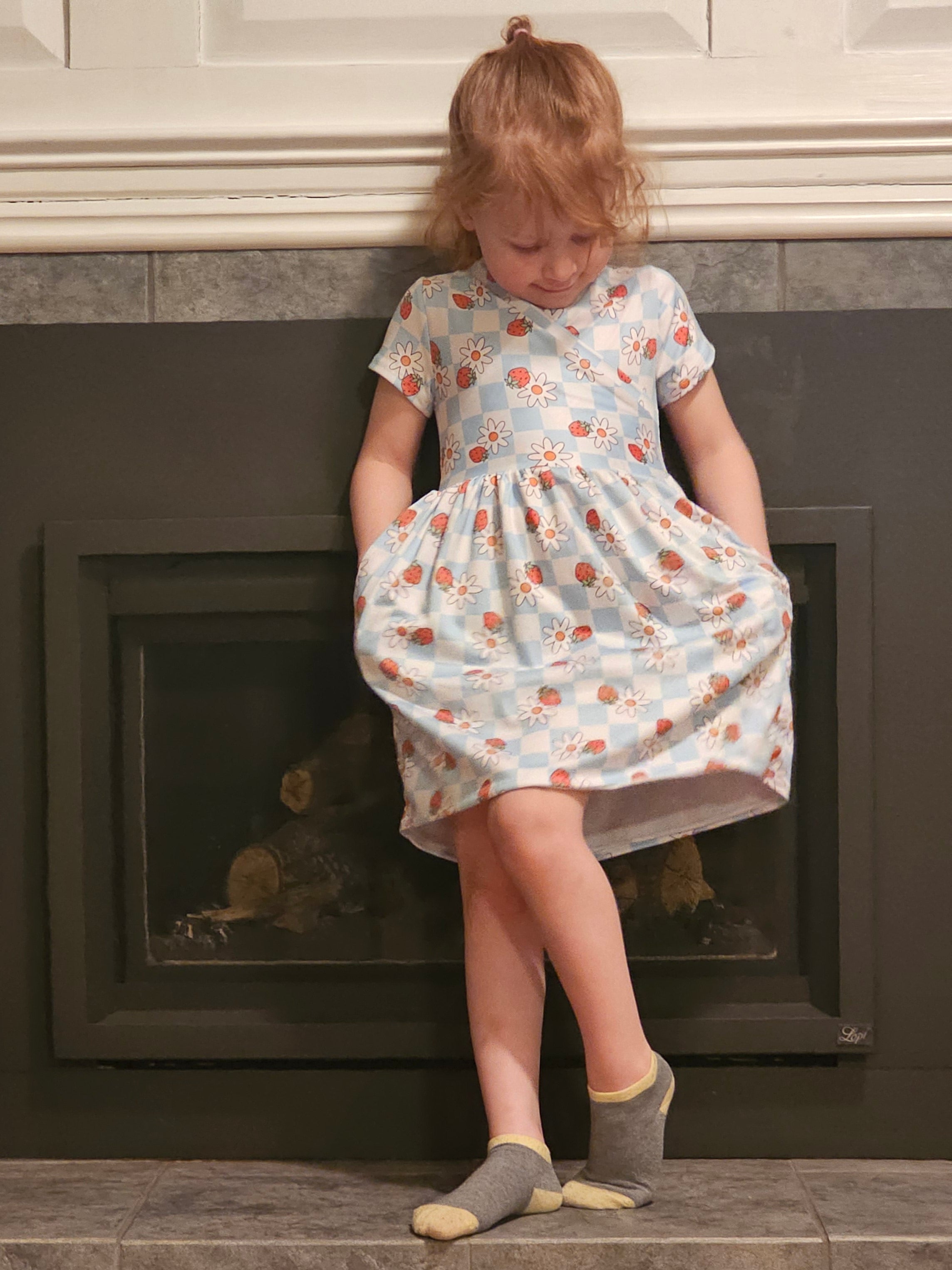 Girls tres belle dress sewing pattern by Ellie and Mac Patterns
Blue daisy floral cotton lycra knit fabric.