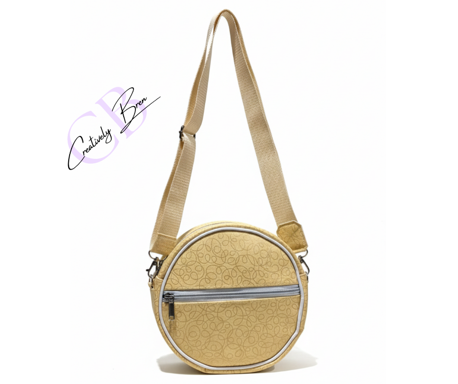 Round crossbody bag sewing pattern. Perfect for travel.