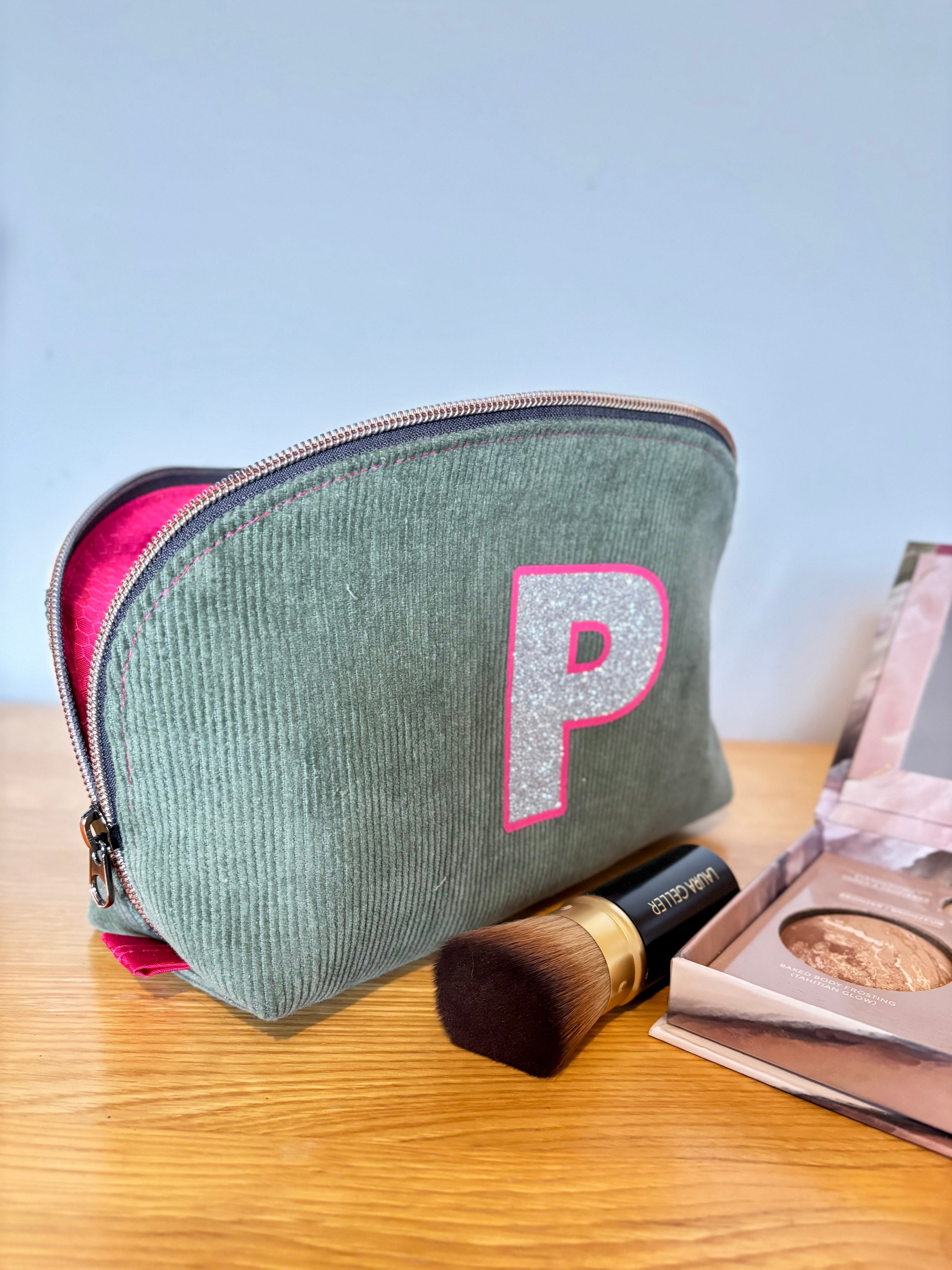 Front angled view of the Tessa Toiletry Pouch zipper bag sewn from the PDF pattern.