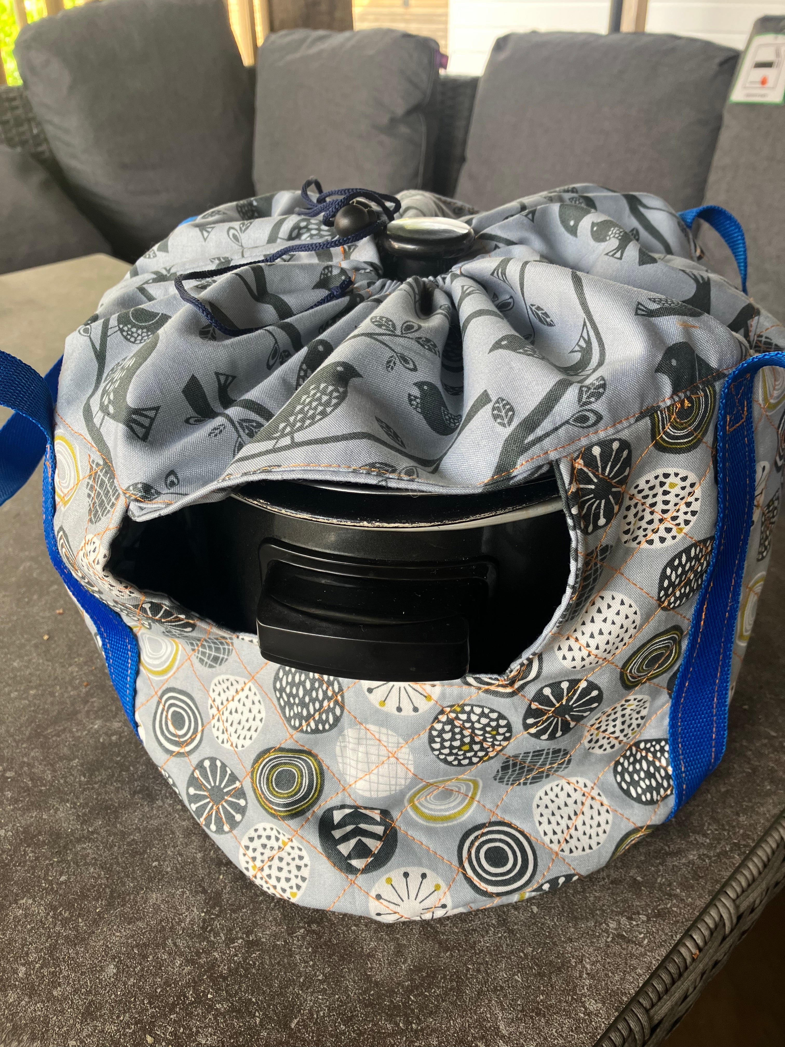 Patterned slow cooker cover. This carrier was made using the warm and cozy slow cooker carrier pattern by Ellie and Mac sewing patterns.