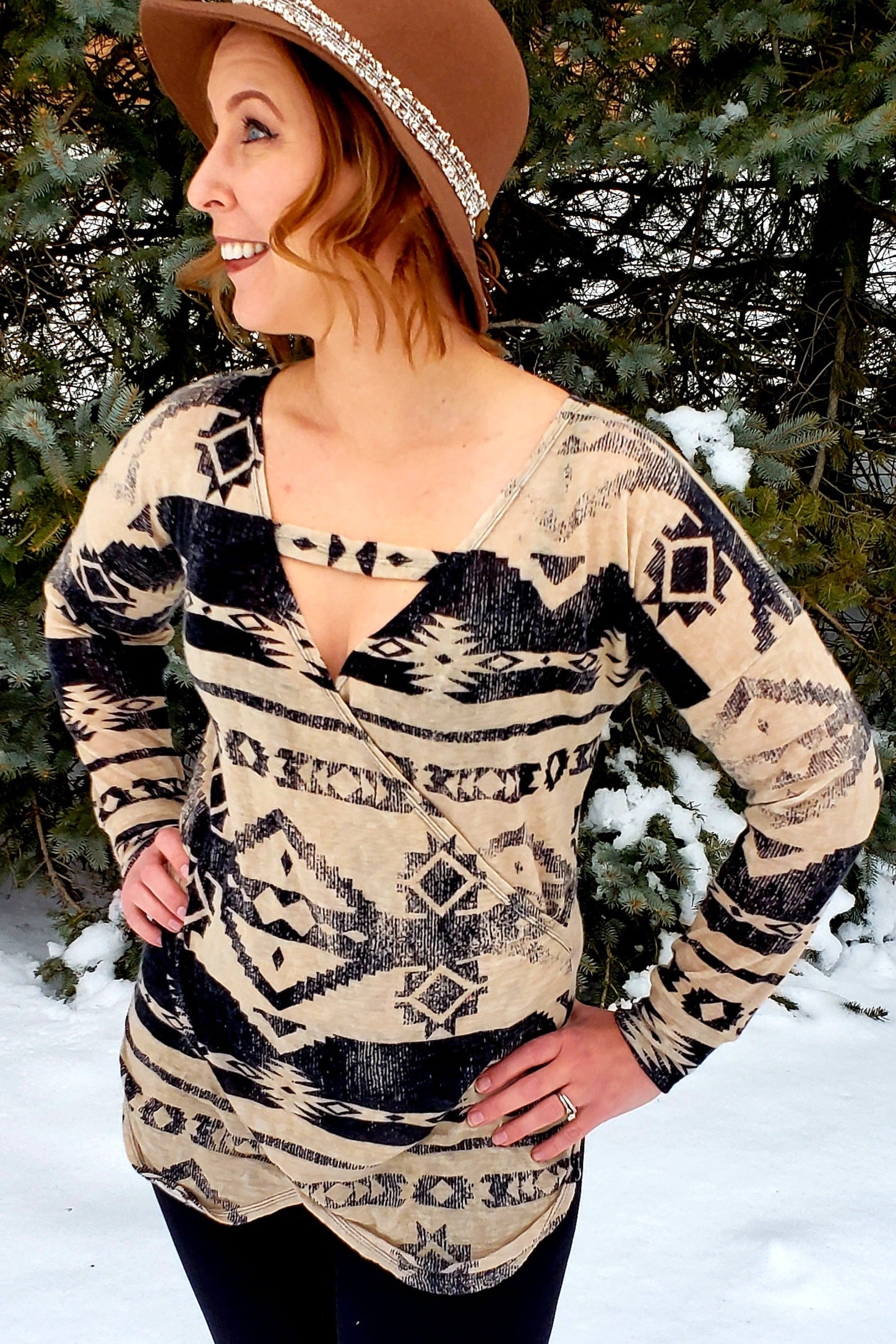 Woman wearing a Faux wrap bodice sewing pattern featuring optional front strap design