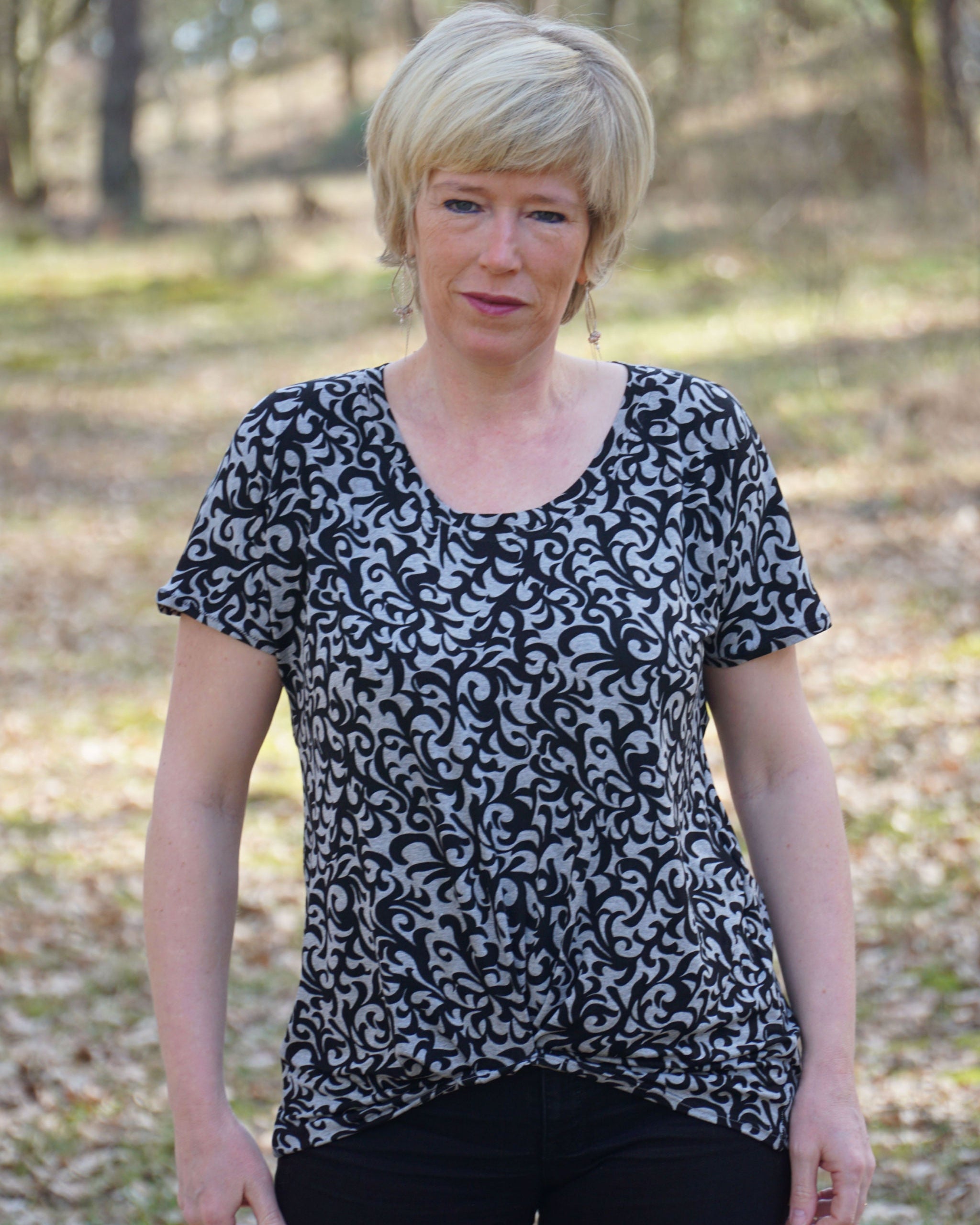 Easy PDF pattern by Ellie and Mac. Twist It Up Top Sewing pattern for knit fabrics. A0, A4, Letter, Projector files. Sew along video tutorial, color step by step instructions, and pattern hack quides.