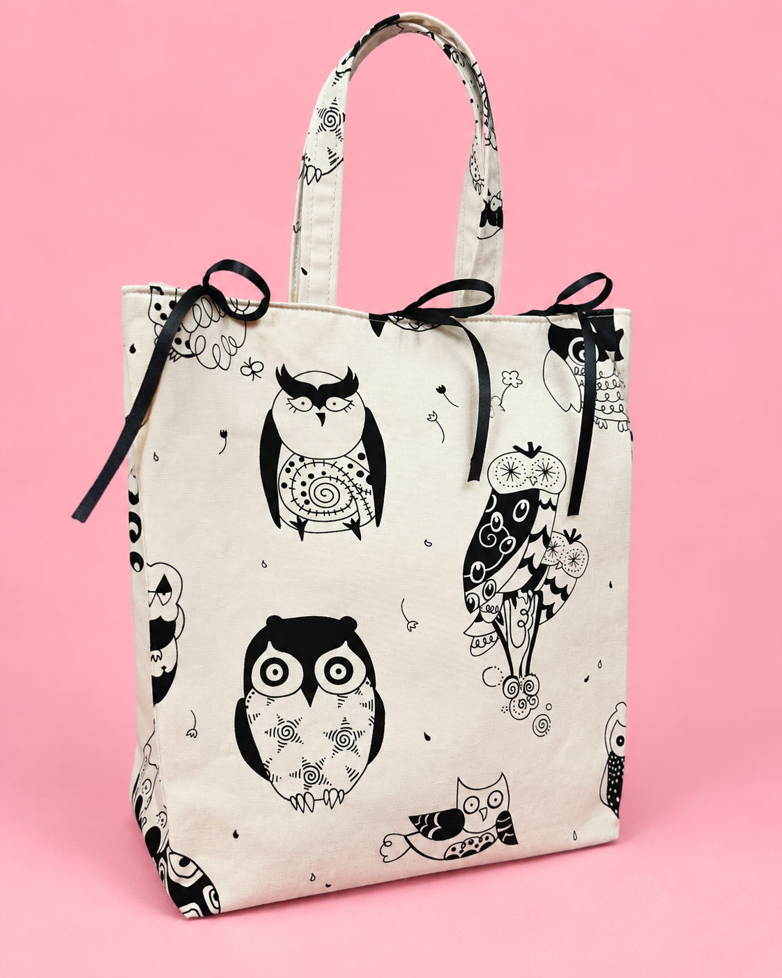 Lined reusable fabric gift bag showing finished interior and handles
