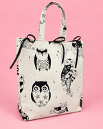 Lined reusable fabric gift bag showing finished interior and handles