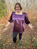 Elegant woven blouse sewing pattern with structured fit