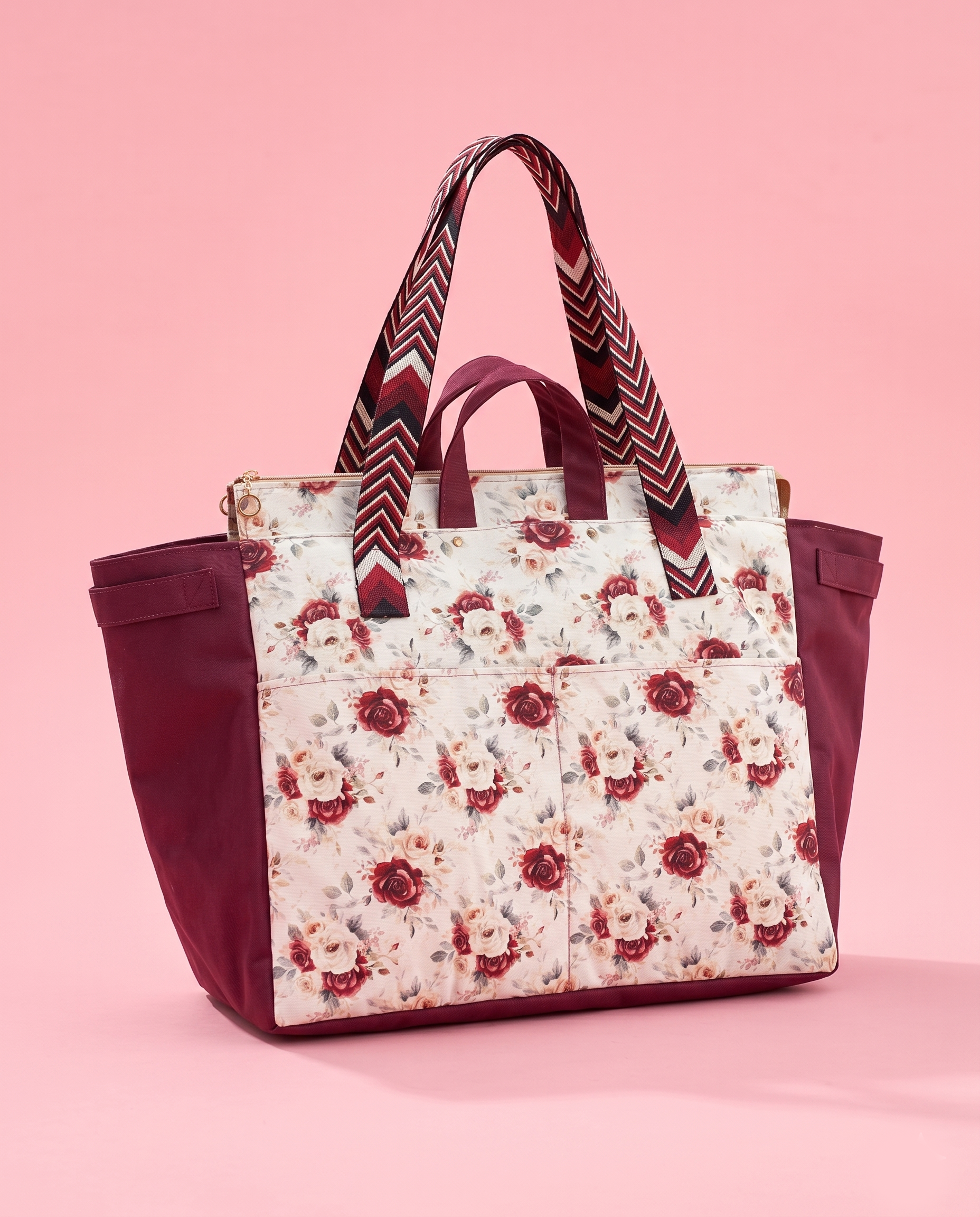 Floral tote bag with red flowers on a pink background