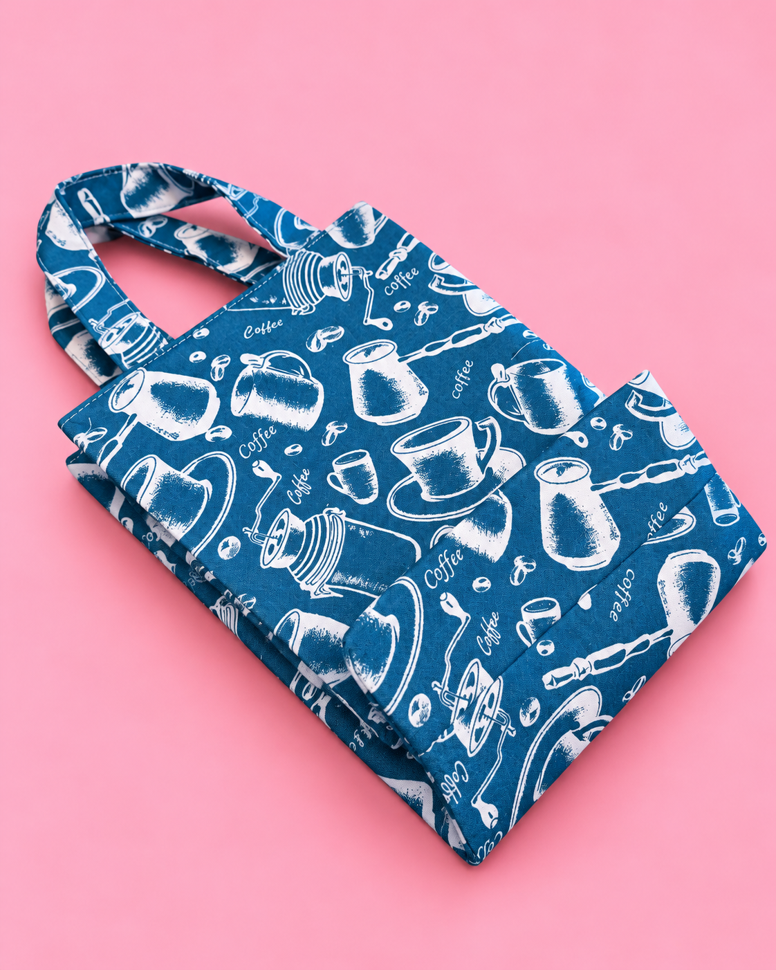Reusable fabric gift bag with sturdy handles and structured shape