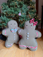 Gingerbread man and woman pillows displayed together from the Jolly Gingerbread People Sewing Pattern.