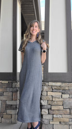 woman with long hair wearing a midi length sweater dress with short sleeves, side slits, and hood. Made using Ellie and Mac Hipster Dress Sewing Pattern.