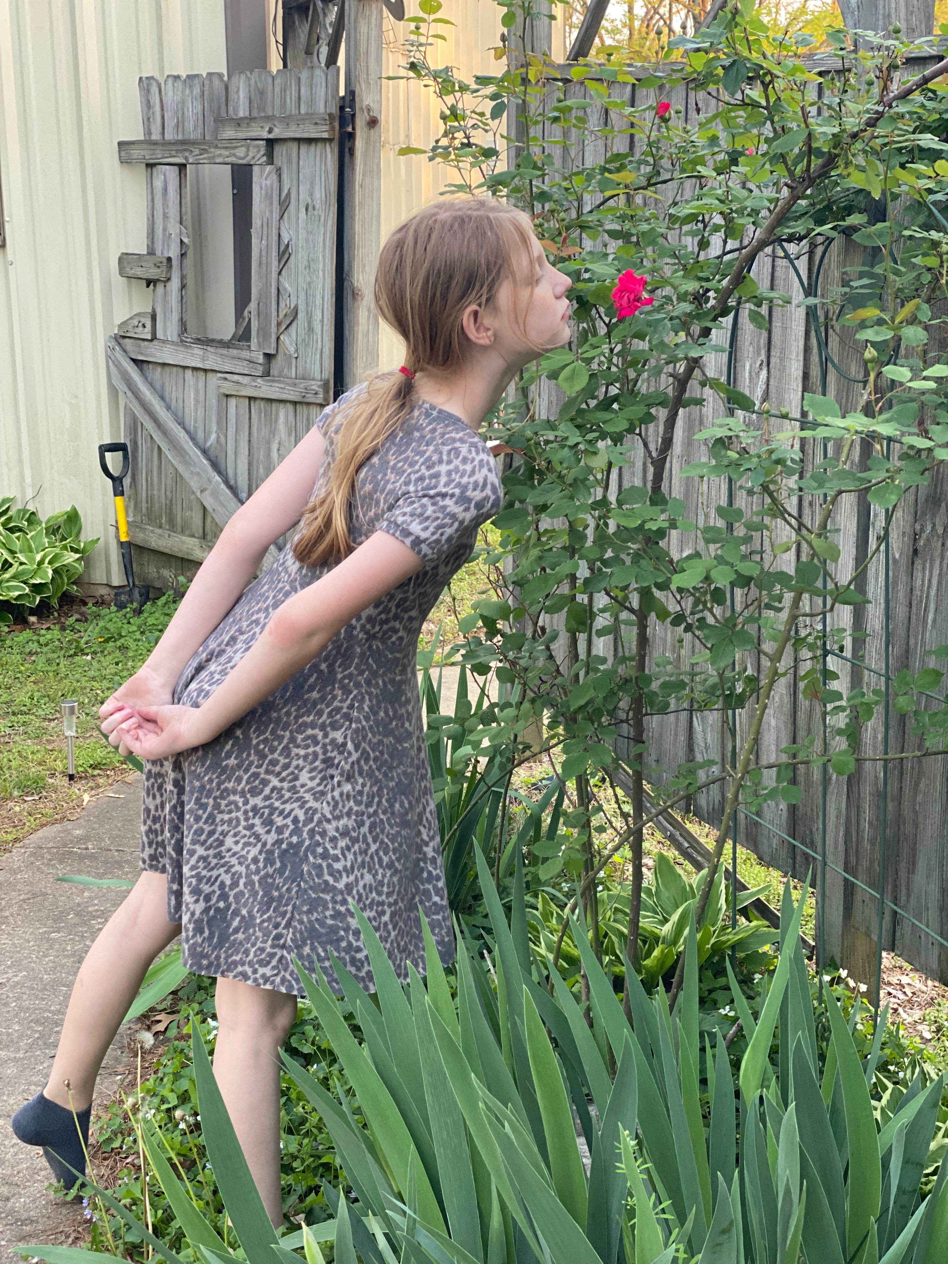 Short sleeve cheetah print with pockets 1/2 circle skirt dress sewing pattern for kids. Sizes 12 months - Teen 18.

PDF sewing pattern.