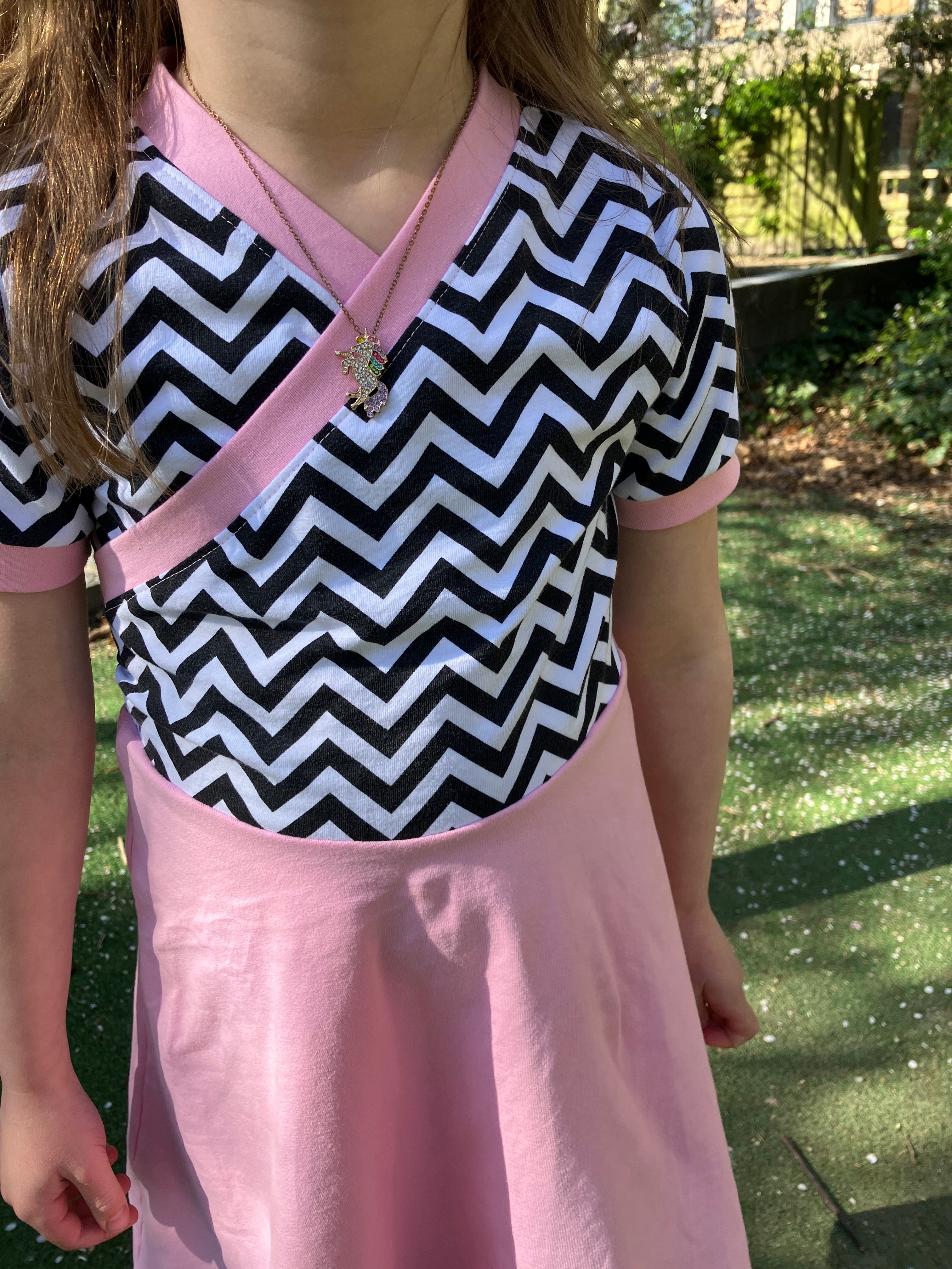 Faux wrap bodice with short banded sleeve dress. Easy sewing pattern.