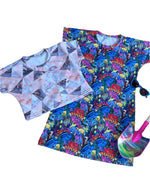 A patterned crop top and dress with a colorful shovel and sunglasses. 