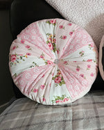 Shabby Chic Patchwork pink pillow on a bed. Made using Ellie and Mac Sydney Sprocket Pillow Pattern. Easy and quick sewing project. quilting pattern.