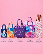 Collection of handmade reusable fabric gift bags in several sizes