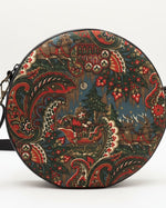 Round bag with intricate pattern on a light gray background. DIY bag.