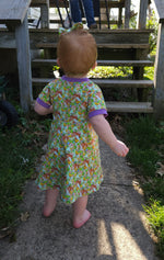 Cute toddler dress pattern. Easy sewing patterns for beginners. Knit dress pattern. Faux wrap bodice. 1/2 circle skirt.