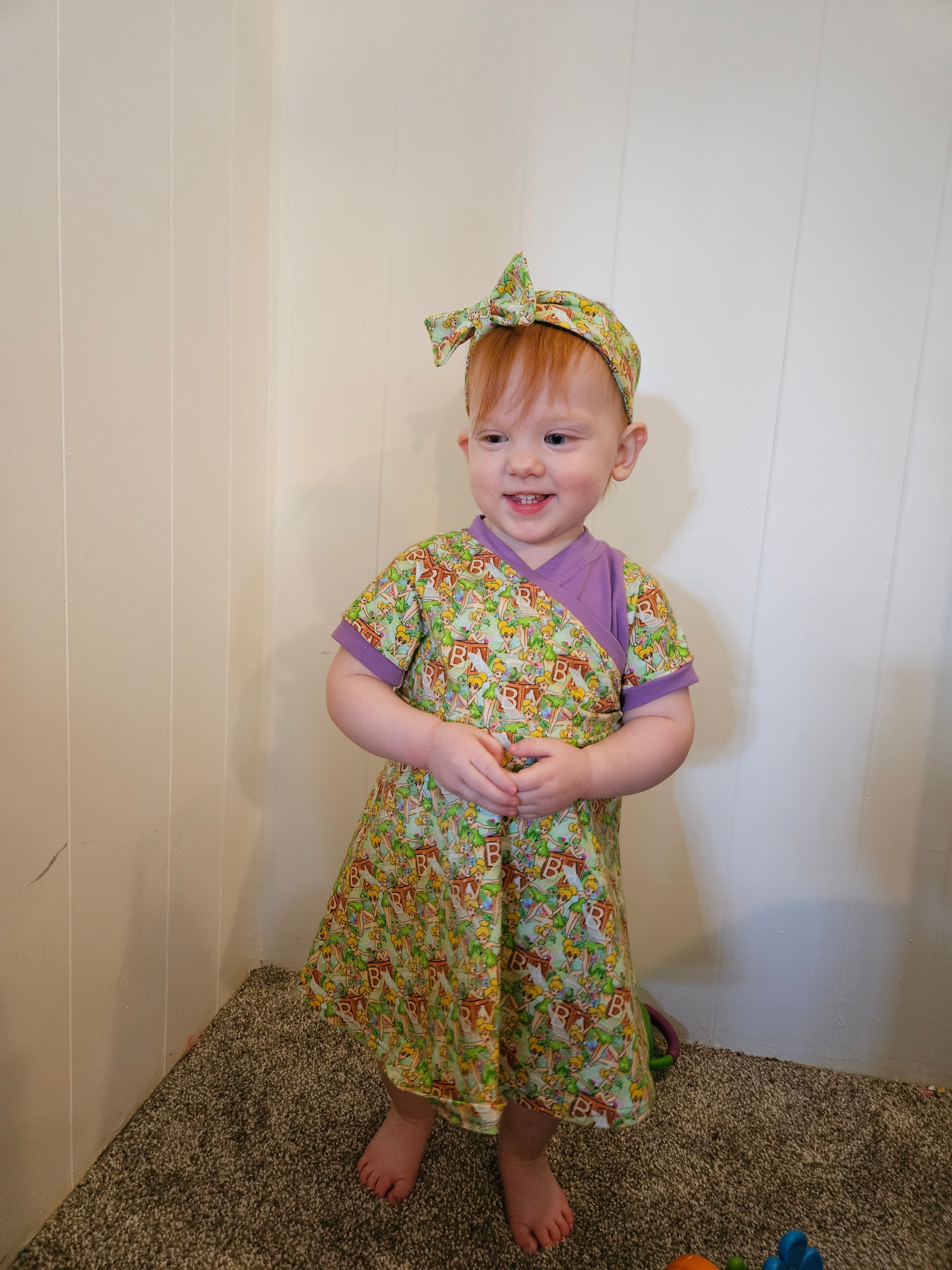 Cute toddler dress pattern. Easy sewing patterns for beginners. Knit dress pattern. Faux wrap bodice. 1/2 circle skirt.