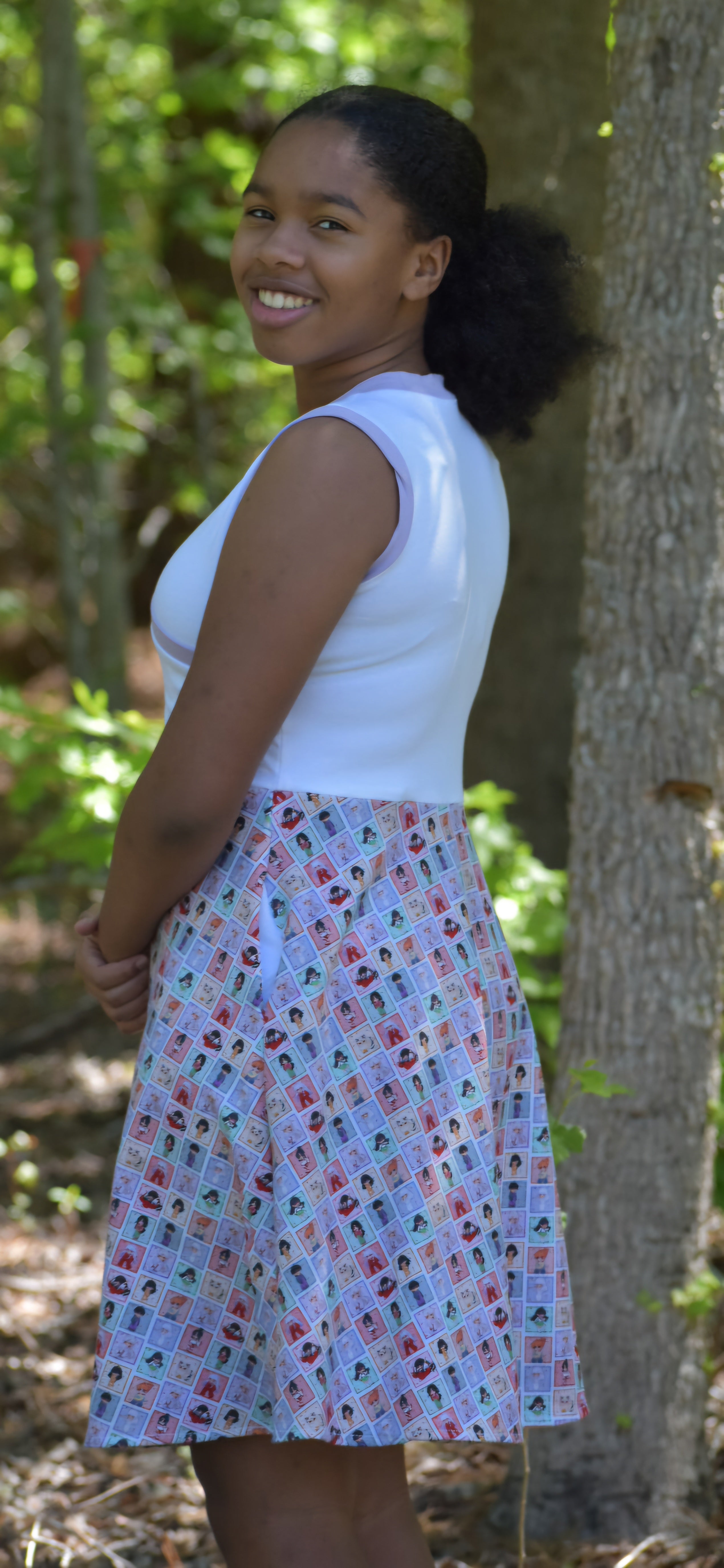 Beautiful tank dress for teens. Easy sewing patterns for beginners. Knit dress pattern. Faux wrap bodice. 1/2 circle skirt.