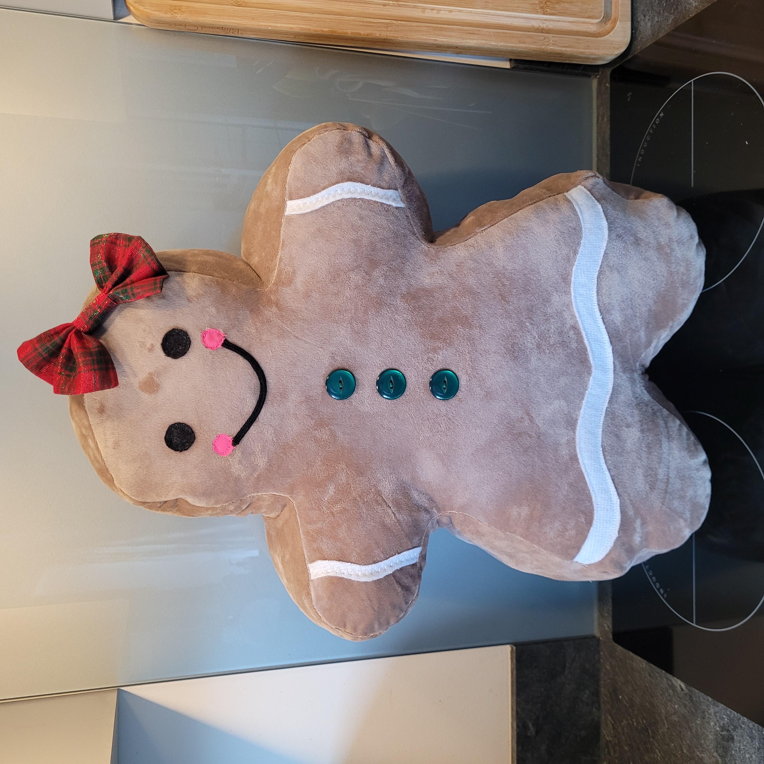 Jolly Gingerbread Woman pillow sewn from the digital sewing pattern with full front view.