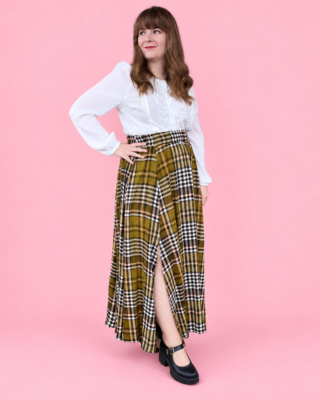 Women's paneled maxi skirt sewing pattern with a flowing silhouette and front slit.