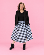 Mila woven midi skirt with elastic waist and paneled silhouette. Includes color photo step by step instructions PDF, A0, A4, Letter print files, projector file, and a full sew-along video tutorial. Easy beginner sewing patterns.