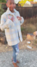 The flannel jacket is made using the Connie Casual Shacket PDF sewing pattern by Ellie and Mac Sewing patterns.