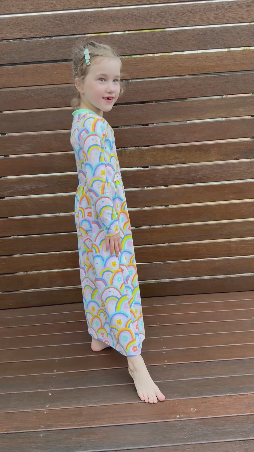 Cute maxi dress for kids. Easy sewing patterns for beginners. Knit dress pattern. Long sleeves with rainbow fabric.