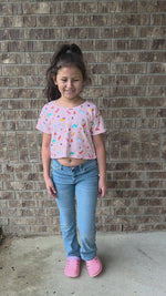 Girl in crop top made using the Kayla Crop Top Sewing pattern.