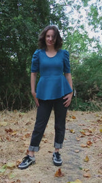 Woman modeling the Petunia Princess Seam Peplum sewing pattern by Ellie and Mac PDF sewing patterns.