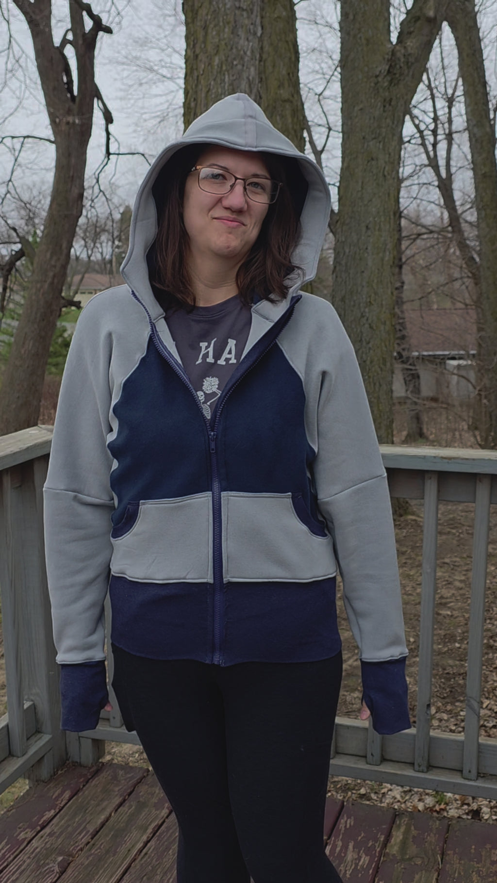 Woman modeling hooded athletic jacket she made. Ellie and Mac sewing patterns.