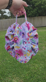 Woven floral print fabric Moon Drawstring Bag Video. Easy PDF Sewing Pattern. DIY Craft Project. Great for traveling, craft storage, picnics, kids toys, and more. How to use a moon bag.