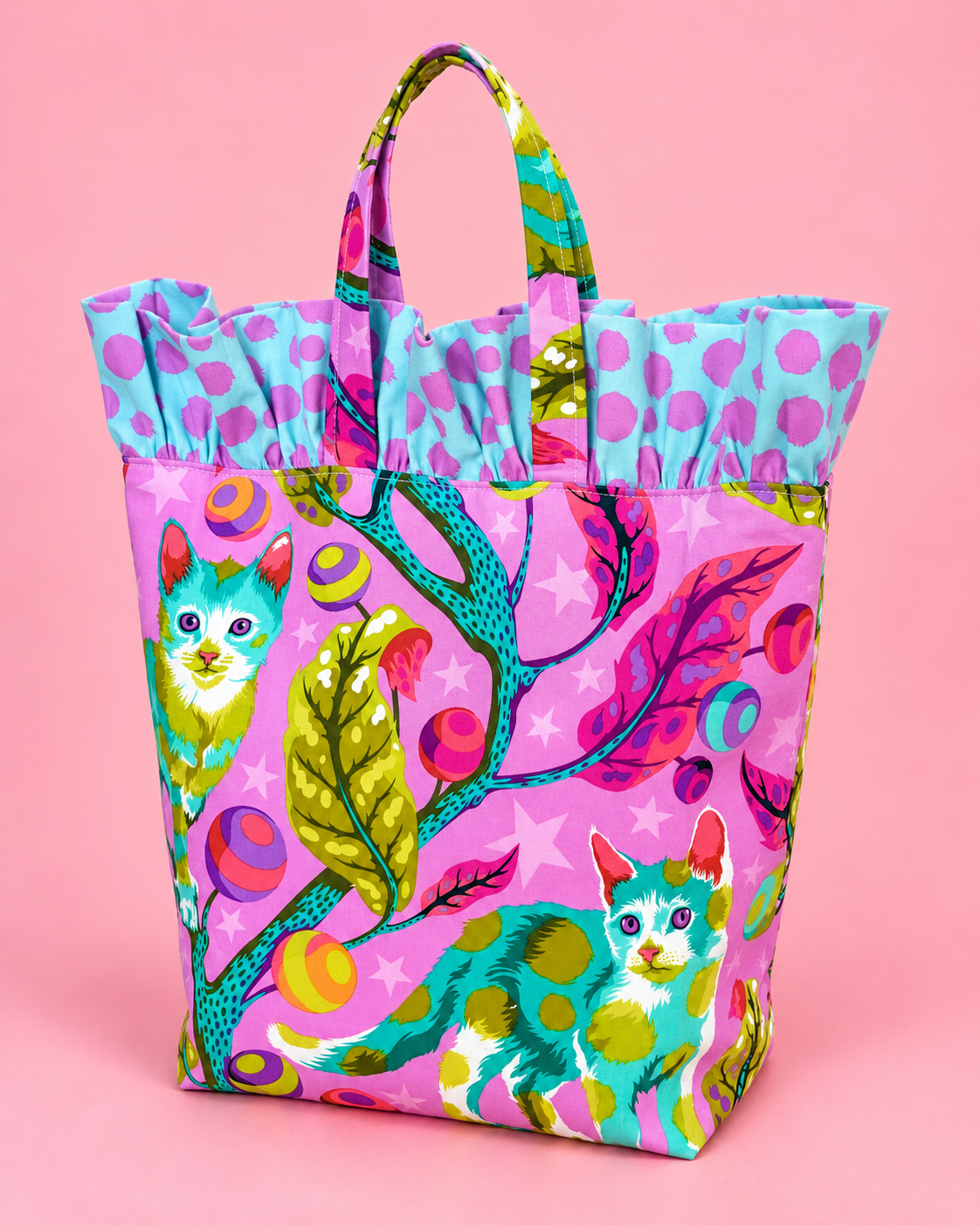 Large floral reusable fabric gift bag with handles and gift tulle