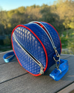 Side profile view of the Ellie bag showing the depth and structure.