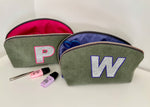 Zipper pouch styled on a bedside table showing everyday usability.