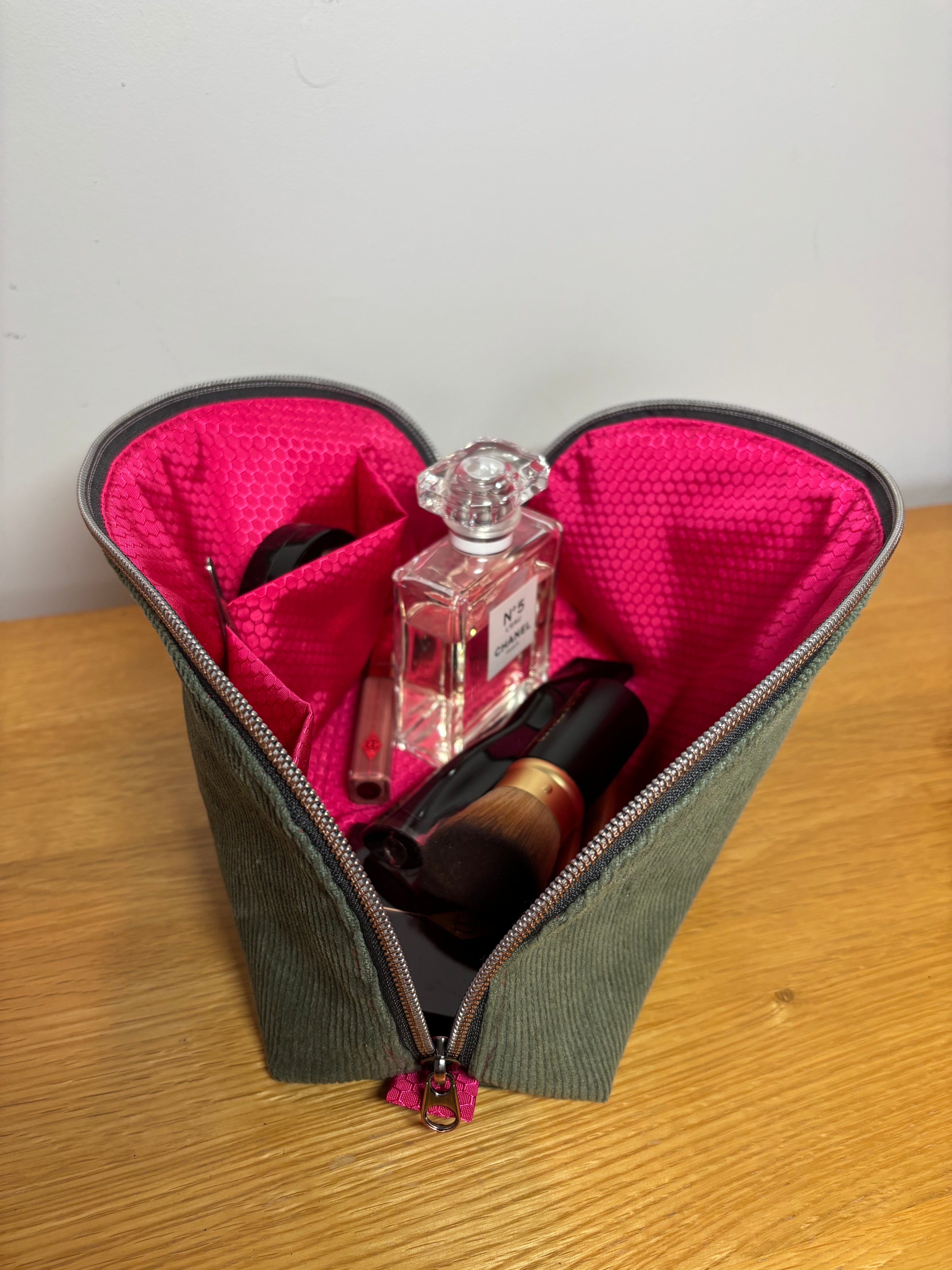 Interior pocket detail inside the Tessa cosmetic and travel zipper pouch.