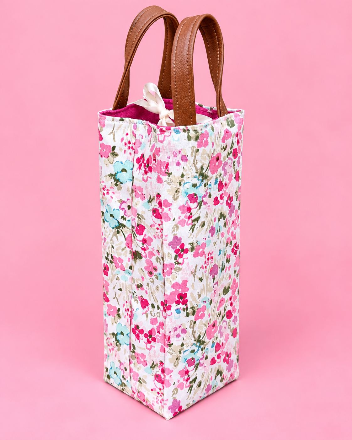 Tall reusable fabric wine bottle gift bag with structured sides and handles