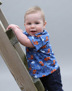 Cute baby boy wearing an oversized tee made using the kids oversized tee pattern by Ellie & Mac.