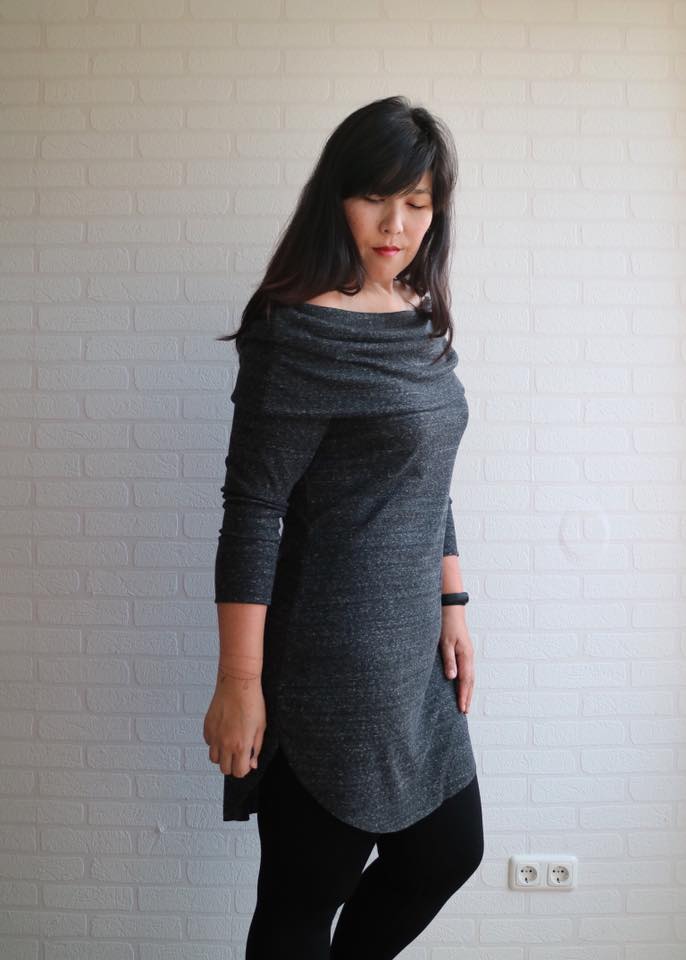 Slouchy Cowl neckline with 3/4 sleeves and curved hem. 