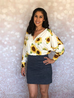 Handmade crossover wrap dress with fitted skirt and batwing bodice detail