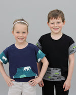 Cropped short sleeve and oversized long sleeved t-shirts on siblings.