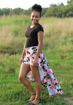 Sew your own Adult Be Invincible Skort with this PDF sewing pattern from Ellie & Mac. This pattern includes sizes XXS-6XL and features a fashionable wrap skirt design over practical shorts. The photo shows the finished garment in a vibrant floral print, and Downloadable for easy printing on A4, A0, and Letter paper.